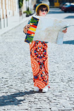 tourist woman looking at the map