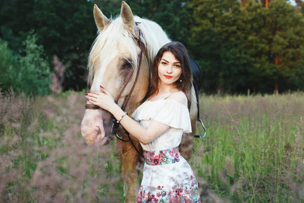 Attractive woman with horse — Stock Photo, Image