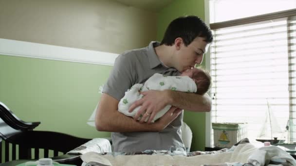 Father embracing baby boy — Stock Video