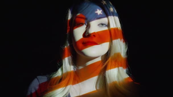 American flag projection on female face — Stock Video