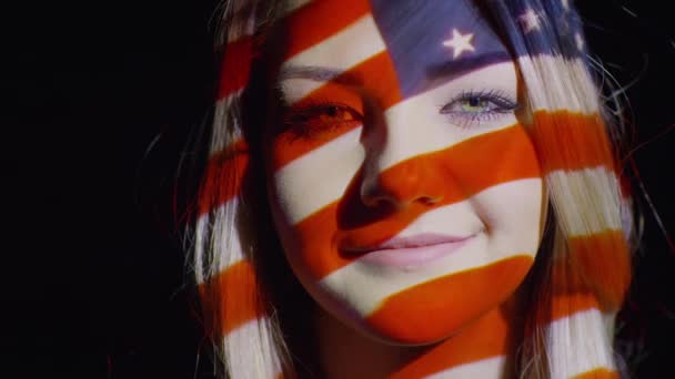 American flag projection on female face — Stock Video