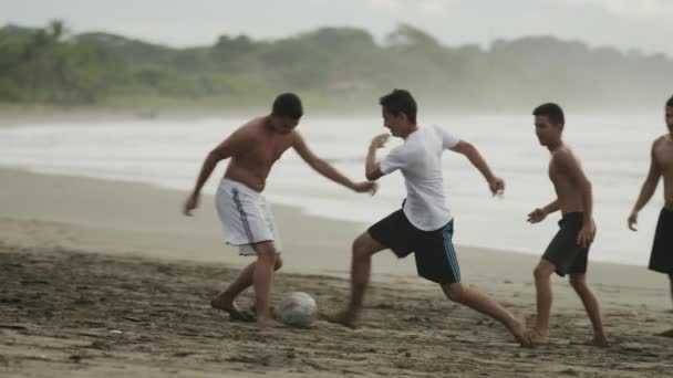 People playing soccer on beach — Stock Video