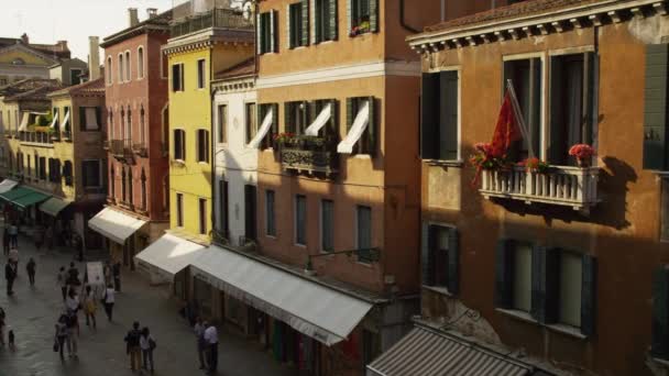 Pedestrians walking on old town street — Stock Video