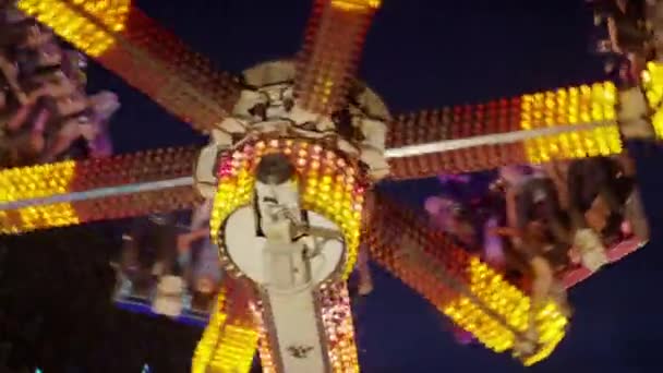 Glowing amusement park rides — Stock Video