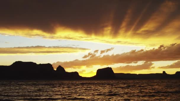 Silhouette of man jumping to Lake Powell — Stock Video