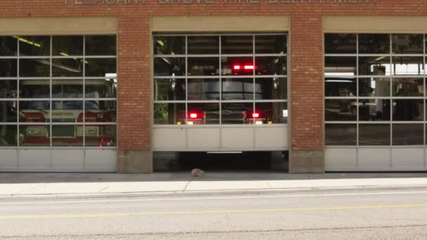 Roller door opening for fire engine — Stock Video