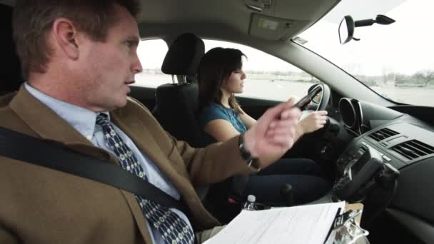 Girl taking driving test — Stock Video