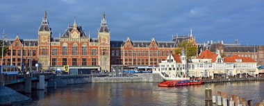 AMSTERDAM NETHERLAND OCTOBER 03 2015 Station Amsterdam Centraal is the largest railway station of Amsterdam, Netherlands, and a major national railway hub. Used by 260,000 passengers a day.