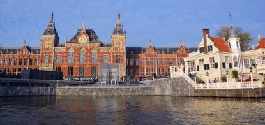 AMSTERDAM NETHERLAND OCTOBER 03 2015 Station Amsterdam Centraal is the largest railway station of Amsterdam, Netherlands, and a major national railway hub. Used by 260,000 passengers a day.