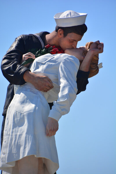 SAN DIEGO USA APRIL 8 2015: Unconditional Surrender sculpture at sea port in San Diego. By Seward Johnson, the statue resembles the photograph of Alfred Eisenstaedt of VJ day in Times Square New York