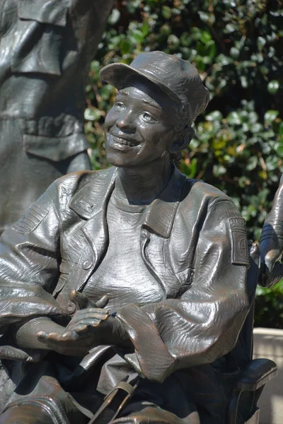 SAN DIEGO CA USA APRIL 8 2015: Detail of the bronze statues of A National Salute to Bob Hope and the Military. On the plaza, there are 15 bronze statues, arranged as if attending a Bob Hope show.