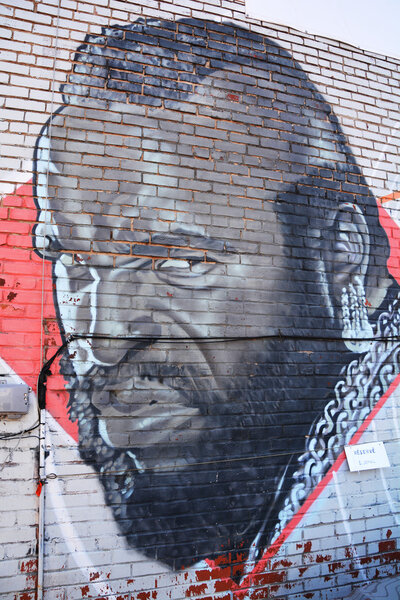 MONTREAL CANADA DEC 02: Street art Montreal MR T on dec 02 2014 in Montreal Canada. Montreal. is the perfect place to walk in the back alleys and abandoned areas, looking for fresh air and street art.