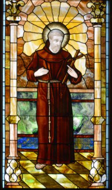 CHARLOTTE NC 06 24 2016: Stained glass window of St. Peter is the oldest Roman Catholic Church in Charlotte. It was established in 1851. Until 1940 it was the only Catholic church in the city. 