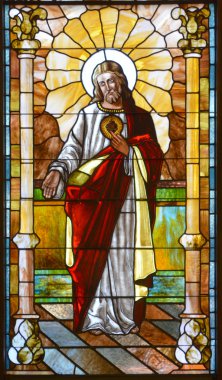 CHARLOTTE NC 06 24 2016: Stained glass window of St. Peter is the oldest Roman Catholic Church in Charlotte. It was established in 1851. Until 1940 it was the only Catholic church in the city. 