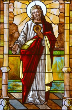 CHARLOTTE NC 06 24 2016: Stained glass window of St. Peter is the oldest Roman Catholic Church in Charlotte. It was established in 1851. Until 1940 it was the only Catholic church in the city. 