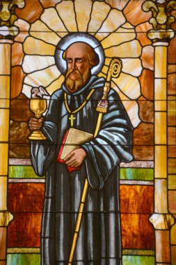 CHARLOTTE NC 06 24 2016: Stained glass window of St. Peter is the oldest Roman Catholic Church in Charlotte. It was established in 1851. Until 1940 it was the only Catholic church in the city. 