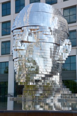 CHARLOTTE NORTH CAROLINA USA JUNE 20 2016: Metalmorphosis is a mirrored water fountain by Czech sculptor David Cerny that was constructed at the Whitehall Technology Park in Charlotte, NC.