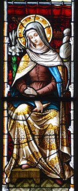 SAVANNAH GEORGIA JUNE 28 2016: Stained glass window at The Cathedral of St. John the Baptist is a Roman Catholic cathedral. It is the Mother Church of the Roman Catholic Diocese of Savannah.