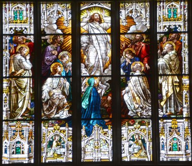 SAVANNAH GEORGIA JUNE 28 2016: Stained glass window at The Cathedral of St. John the Baptist is a Roman Catholic cathedral. It is the Mother Church of the Roman Catholic Diocese of Savannah.