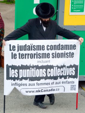 MONTREAL CANADA AUGUST 21:Unidentified people form jewish Hasidic Orthodox Judaism, participating in a rally to condemn the Israel occupation an bombing on Gaza On 08 21 2014 in Montreal Quebec Canada