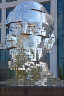 CHARLOTTE NORTH CAROLINA USA JUNE 20 2016: Metalmorphosis is a mirrored water fountain by Czech sculptor David Cerny that was constructed at the Whitehall Technology Park in Charlotte, NC.