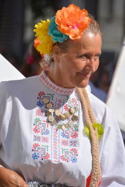 Montreal Qubec Canada 08 01: 2015: Bulgar halk dansçıları Bulgaristan 'ın halk müziği özellikleriyle yakından ilişkili asimetrik metre,' hızlı 've' yavaş 'kombinasyonları ise' yavaş 'ritmi oluşturuyor