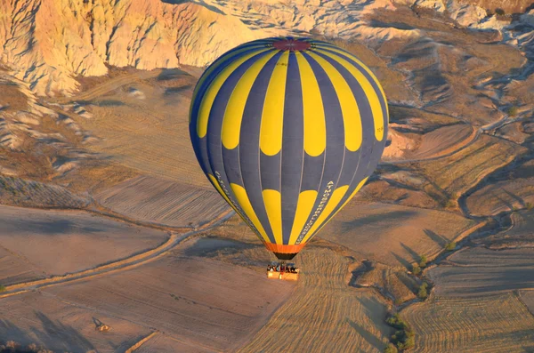 GOREME, TURKEY - OCTOBER, 02: Hot air balloon fly over Cappadocia is known around the world as one of the best places to fly with hot air balloons on october 02, 2013 in Goreme, Cappadocia, Turkey.