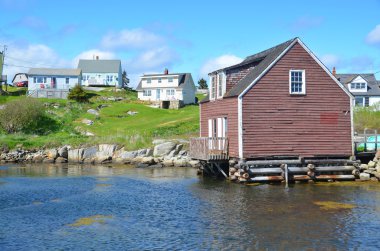 Peggy 's Cove Nova Scotia 6 Haziran: Peggy' s Cove 'daki tipik balıkçı kulübesi 6 Haziran 2014 tarihinde Nova Scotia' daki St. Margarets Körfezi 'nin doğu kıyısında yer alan küçük bir kırsal topluluk..