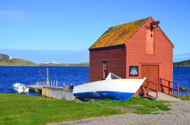 Trinity Newfoundland 12 Haziran: 12 Haziran 2014 'te Trinity Newfoundland' da tipik bir balıkçı evi. Kasaba, eyalet tarafından Kayıtlı Miras Yapısı olarak tanınan bir dizi bina içeriyor.. 