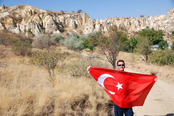 Goreme Turkey October Man Waving Turkish Flag Front Capadocia Landscape — стоковое фото