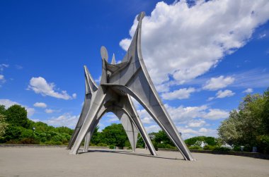 MONTREAL, CANADA - JUNE 19: The Alexander Calder sculpture L'Homme is a large-scale outdoor sculpture on june 19 2013 in Parc Jean-Drapeau, located in Montreal. Made for 1967 World Fair