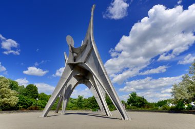 MONTREAL, CANADA - JUNE 19: The Alexander Calder sculpture L'Homme is a large-scale outdoor sculpture on june 19 2013 in Parc Jean-Drapeau, located in Montreal. Made for 1967 World Fair