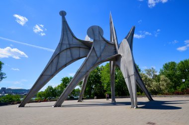 MONTREAL, CANADA - JUNE 19: The Alexander Calder sculpture L'Homme is a large-scale outdoor sculpture on june 19 2013 in Parc Jean-Drapeau, located in Montreal. Made for 1967 World Fair