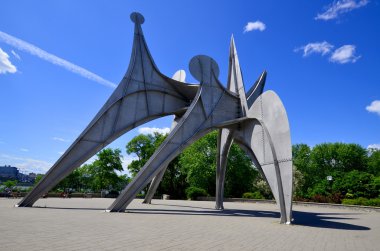 MONTREAL, CANADA - JUNE 19: The Alexander Calder sculpture L'Homme is a large-scale outdoor sculpture on june 19 2013 in Parc Jean-Drapeau, located in Montreal. Made for 1967 World Fair