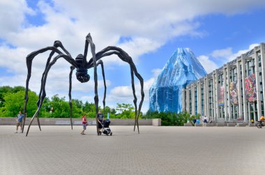 OTTAWA CANADA JUNE 30: Spider sculpture in front the National Gallery of Canada, located in the capital city Ottawa, Ontario, is one of Canada's premier art galleries. On june 30 2013 in Ottawa Canada