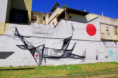 Buenos Aires Nov 24: La Boca mahallelerinde 24 Kasım 2011 'de Buenos Aires' te sokak sanatı. Arjantin 'in duvarları duvar resimleri, garip boyanmış figürler, duvar yazıları ve şablonlarla canlandı.