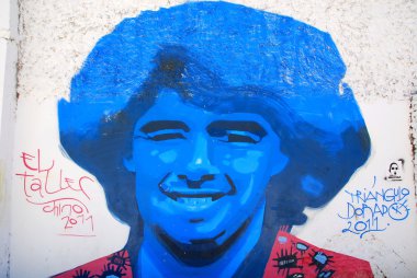 BUENOS AIRES NOV 24: Diego maradona graffiti on November 24, 2011 in Buenos Aires. The walls of the Argentine city enlivened by murals, whimsical painted figures, graffiti and stencils