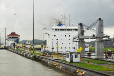 GATUN LOCKS - PANAMA CANAL-NOV. 7: Trains (mules) side Panama Canal.  These mules are used for side-to-side and braking control in the rather narrow locks On nov. 7 2012 in Panama.