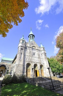 MONTREAL QUEBEC CANADA 10 12 2012: Saint-Clement church. The faade has uncommon components, deep niches in the pillars, sculpted friezes over the portal, heraldies, small columns