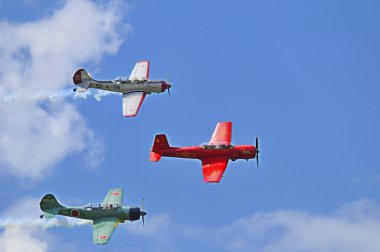 BROMONT - QUEBEC - CANADA - JULY 1: Pilots in action during air show on July 1 2012. Bromont, Canada. Air show at the Roland-Desourdy Airport to benefit LEUCAN for cancer research.