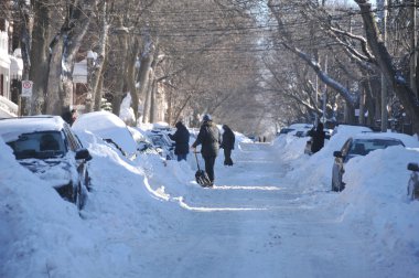 MONTREAL-CANADA DEC. 27:Cars cover of snow on Merose Street. The snow storm slam Montreal with 45 cm of snow, Canada on December 27, 2012 after knocking out power to thousands of homes in the U.S..