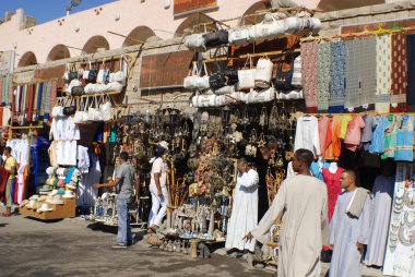 KARNAK EGYPT NOVEMBER 26:Men sale souvenirs in typical street market on november 26 2009 Karnak Egypt. More than 20 percent of Egypts 76 million people live below the poverty line.