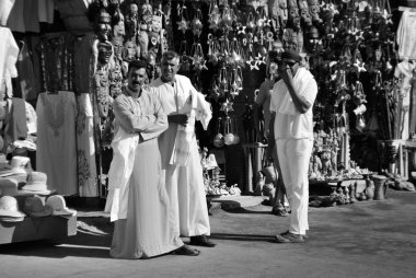 KARNAK EGYPT NOVEMBER 26:Men sale souvenirs in typical street market on november 26 2009 Karnak Egypt. More than 20 percent of Egypts 76 million people live below the poverty line.