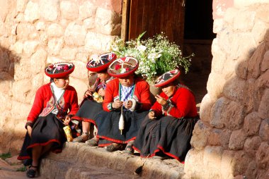 NEAR CUSCO PERU-NOVEMBER 15, 2010: Women in traditional clothes