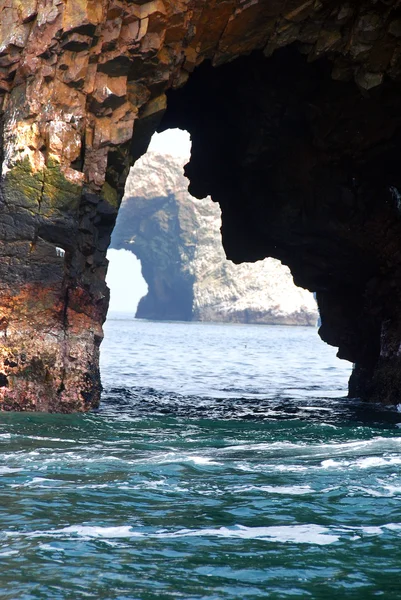 Stone Arch in sea at day