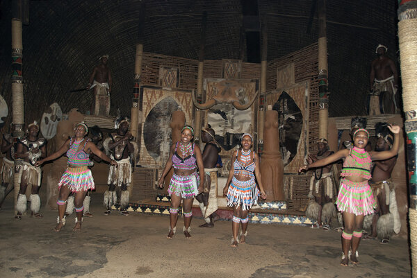SAKALAND-NOVEMBER 27 : Unidentified Zulu dancers wear traditional Zulu clothing, during presentation of a Zulu show on November 27, 2010 Shakaland Zulu Cultural Village, KwaZulu-Natal, South Africa