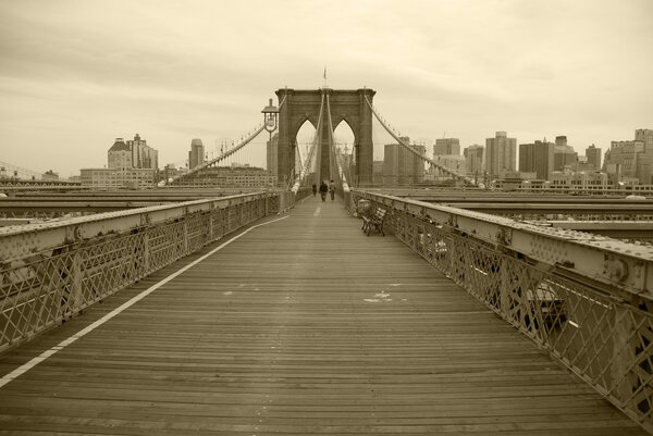 A bottom view of Brooklyn Bridge, Completed in 1883, Brooklyn Bridge connects the boroughs of Manhattan and Brooklyn, spanning the East River