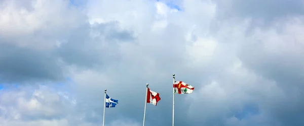 Three Flags Cloudy Sky Background — Stockfoto