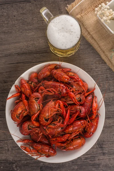 Boiled big crawfish on the wooden surface — Stock Photo, Image