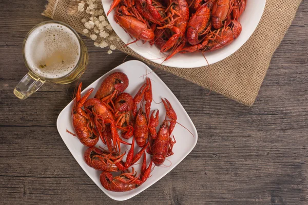 Boiled big crawfish on the wooden surface — Stock Photo, Image